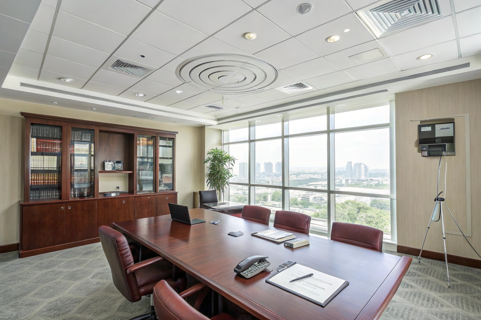 A modern office meeting room with unnoticed security devices