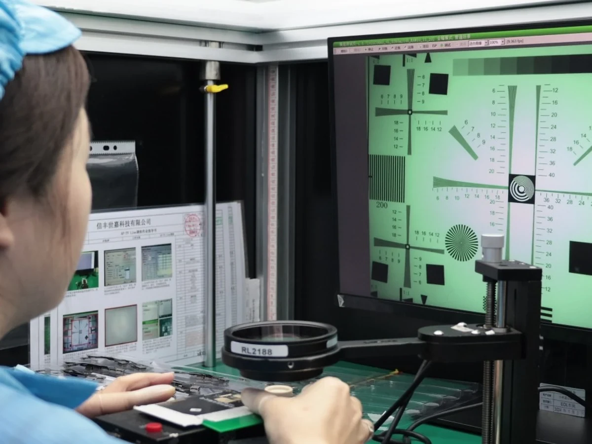 Optical inspection station for camera modules