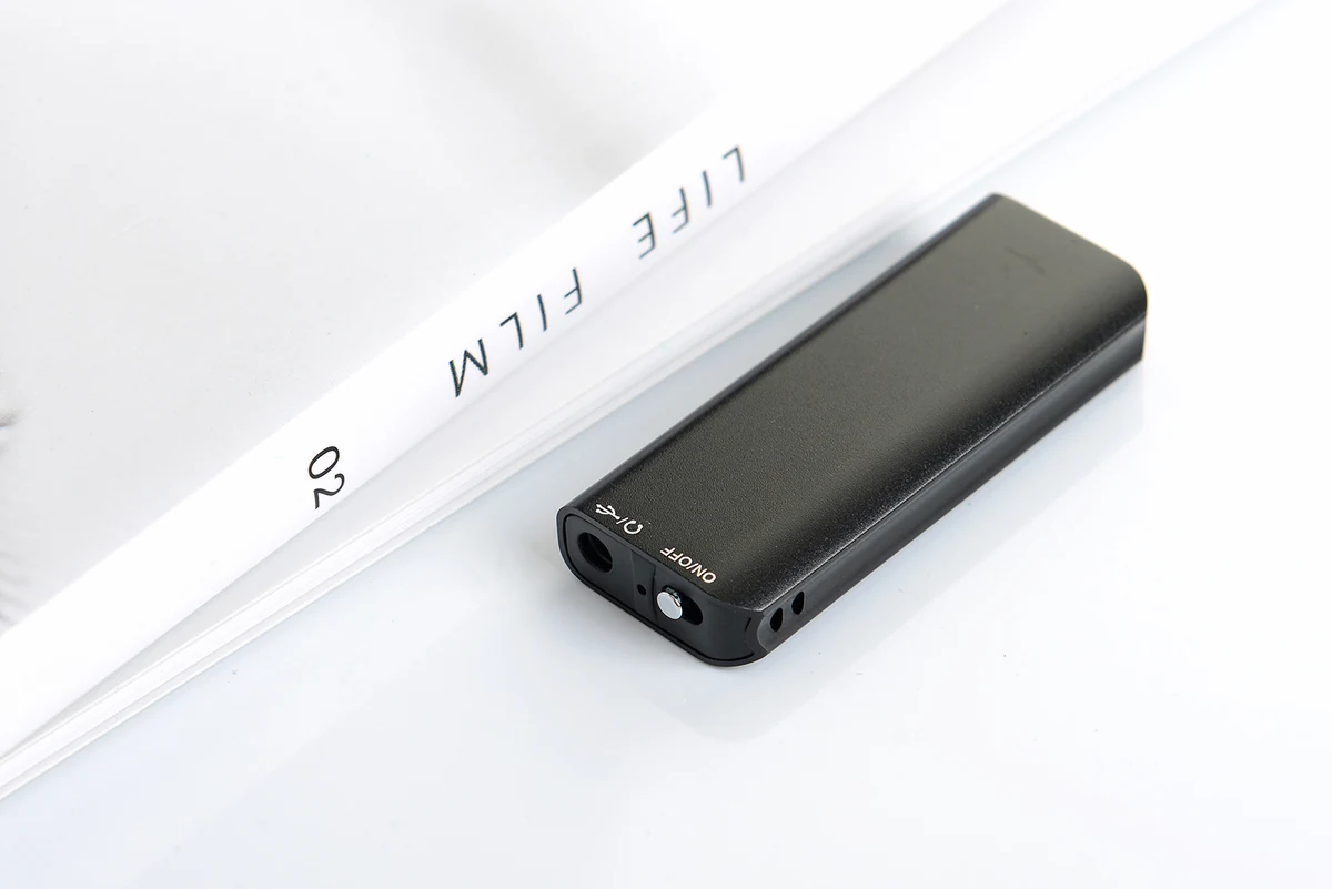 Q23 recorder top control and housing on a desk