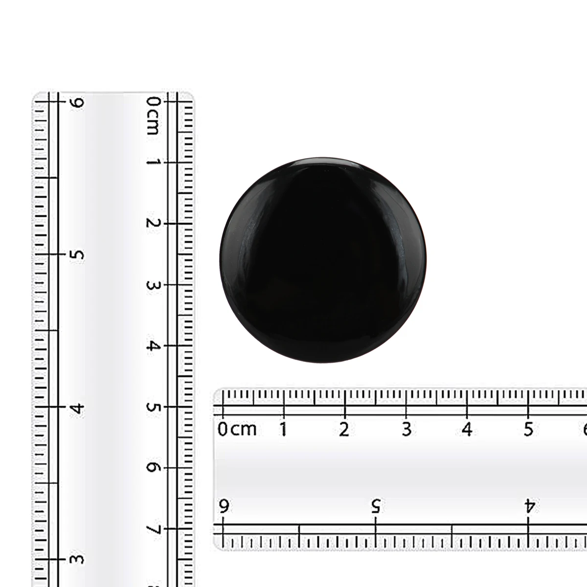 Q3 circular voice recorder measured beside centimeter rulers