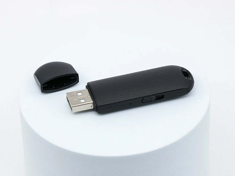 Q62 USB recorder with cap removed on a display plinth