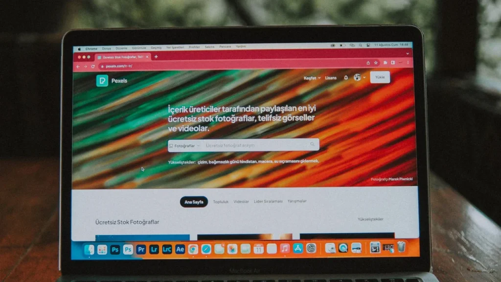 Laptop displaying a web browser on a desk
