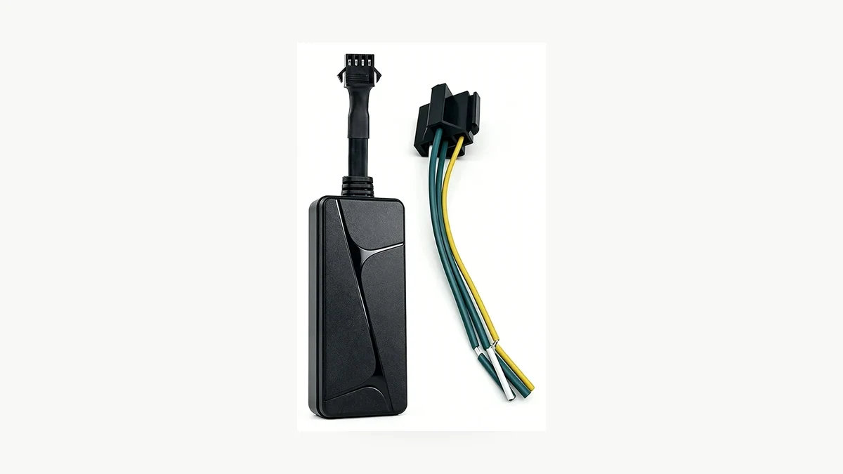 QZT N70 vehicle GPS tracker with its connection harness, representing the reporting device